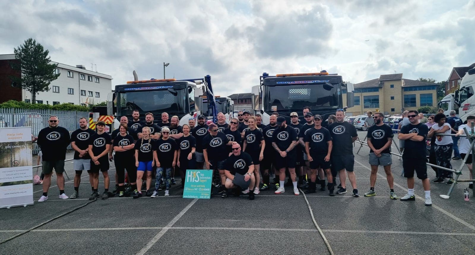 HiS group photo in front of council/recycling trucks before a Big Pull